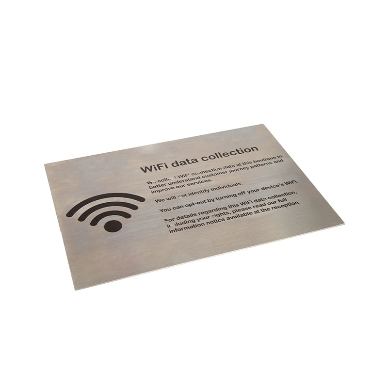 How can nameplates enhance the overall quality of a corporate headquarters or office space through materiality and craftsmanship?